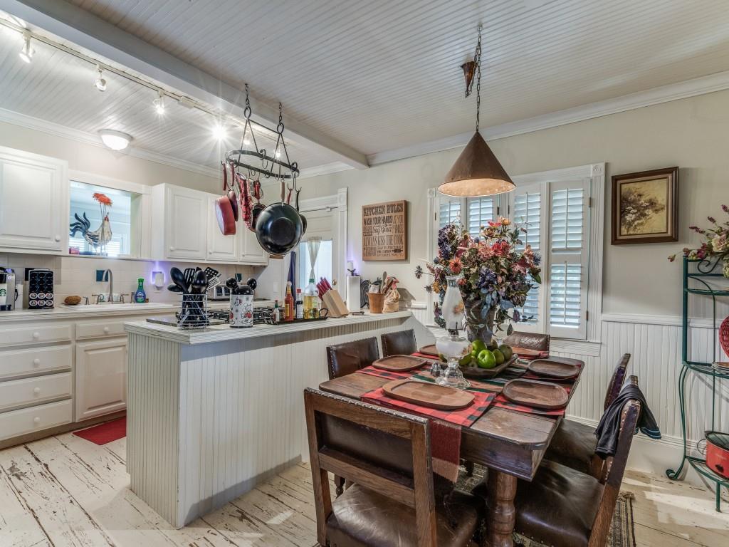 392 Mt Pleasant Road Valley View, TX 76272 - Photo 9 of 27 a kitchen with a table and chairs in it