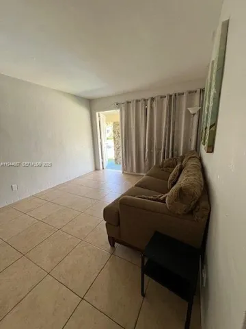 a room with furniture and a window