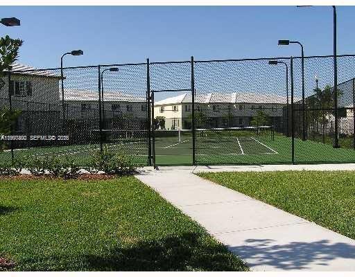 1114 Lucaya Drive Riviera Beach, FL 33404 - Photo 5 of 6 a view of a backyard