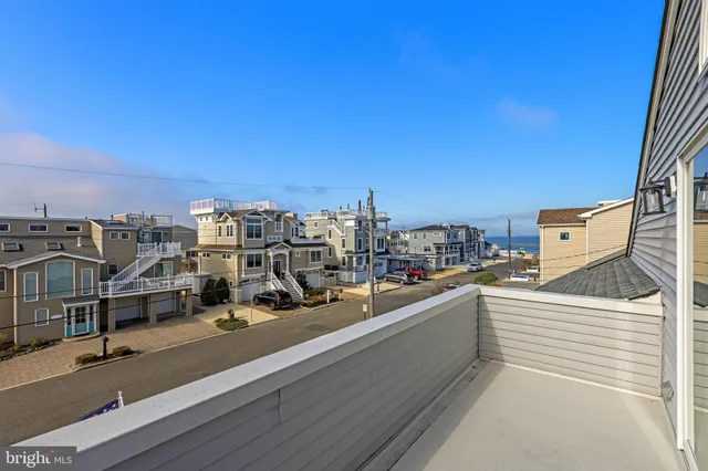 a view of a balcony with city view
