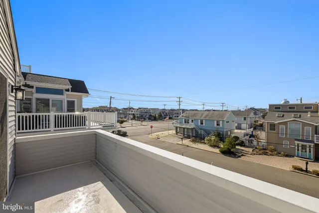 a view of balcony with furniture