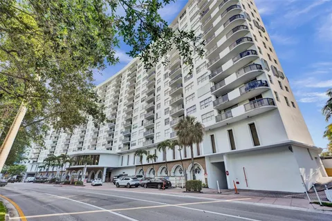 a view of a building with a street