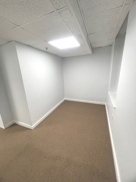 475 Commonwealth Avenue, Unit G3 Boston, MA 02215 - Photo 10 of 15 an empty room with a empty space and windows