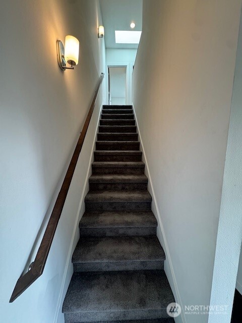 4503 15th Avenue South, Unit B Seattle, WA 98108 - Photo 12 of 25 a view of entryway and hall with wooden floor
