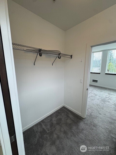 4503 15th Avenue South, Unit B Seattle, WA 98108 - Photo 23 of 25 a view of a room with rack on the wall