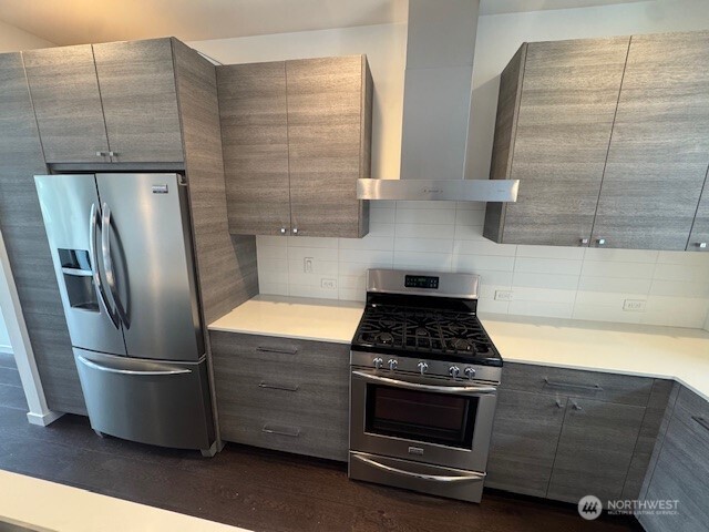 4503 15th Avenue South, Unit B Seattle, WA 98108 - Photo 8 of 25 a kitchen with appliances and cabinets