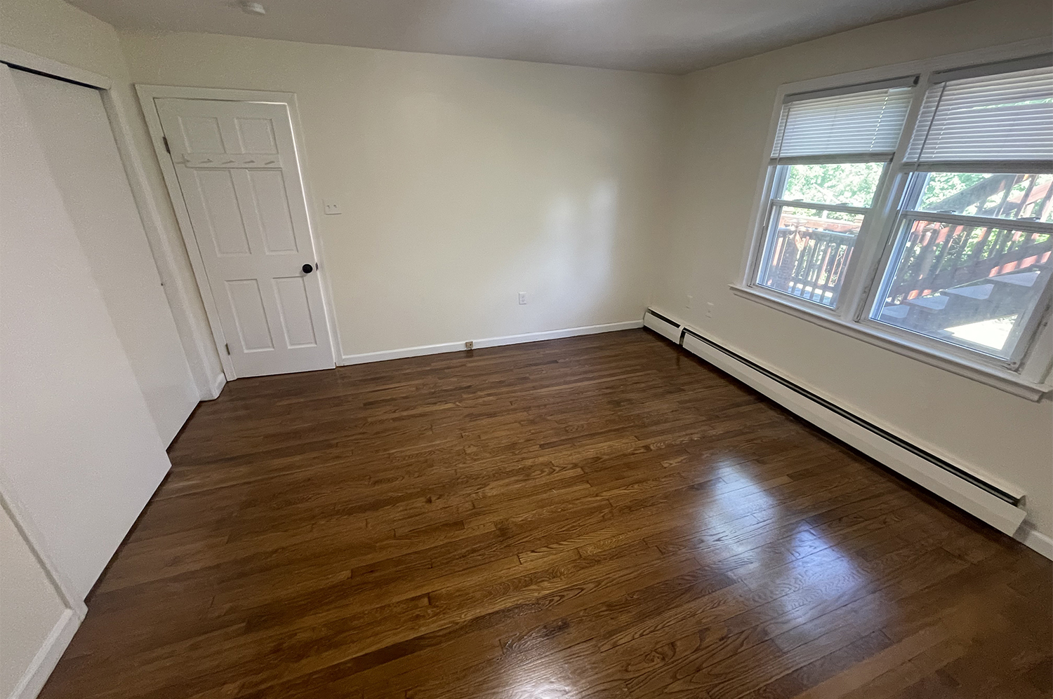 235 Russell Street, Unit 1 New Haven, CT 06513 - Photo 11 of 19 a view of an empty room and wooden floor
