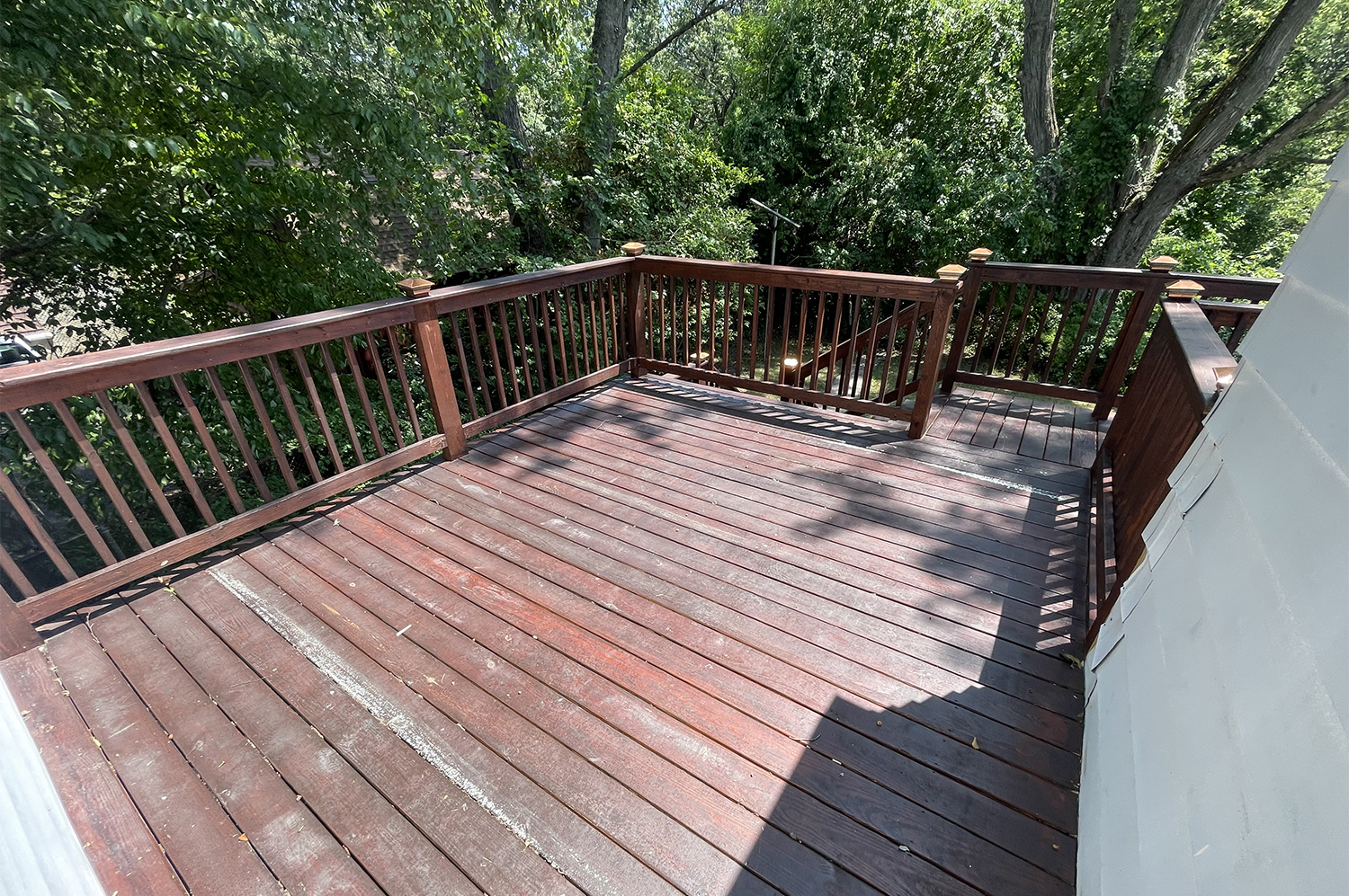 235 Russell Street, Unit 1 New Haven, CT 06513 - Photo 15 of 19 a balcony with wooden floor