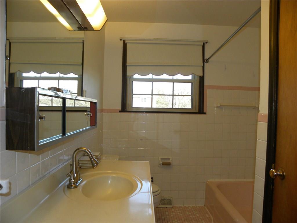 222 Roth Street Houston, PA 15342 - Photo 14 of 25 Retro full bath on the main floor w/ linen closet