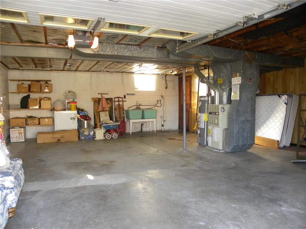 Likely the biggest 1 car garage ever! Plus and extra wide driveway for additional parking.