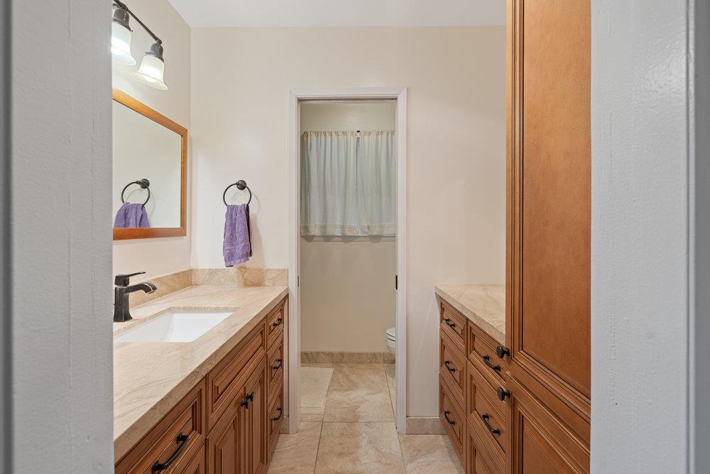 4760 Soquel Creek Road Soquel, CA 95073 - Photo 15 of 29 a bathroom with a sink a vanity and a mirror