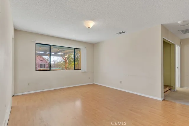 an empty room with window