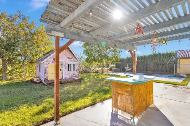 a view of swimming pool with a patio