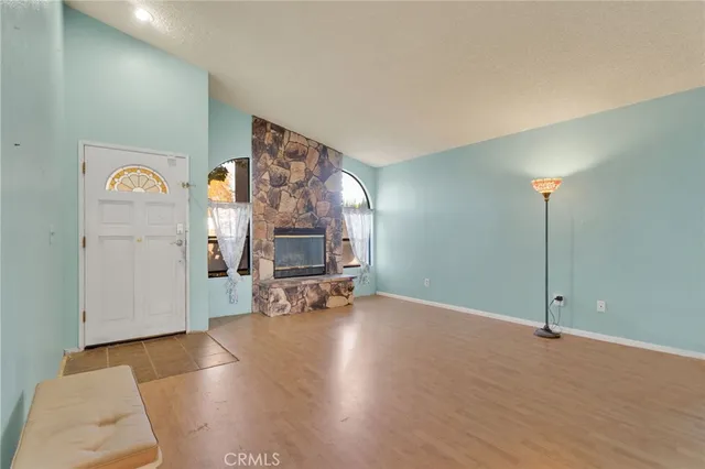 a view of a livingroom with a furniture and a flat screen tv