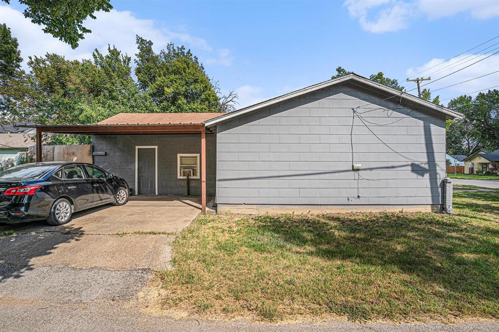 4501 Parrish Road Haltom City, TX 76117 - Photo 13 of 13 a view of a house with a yard