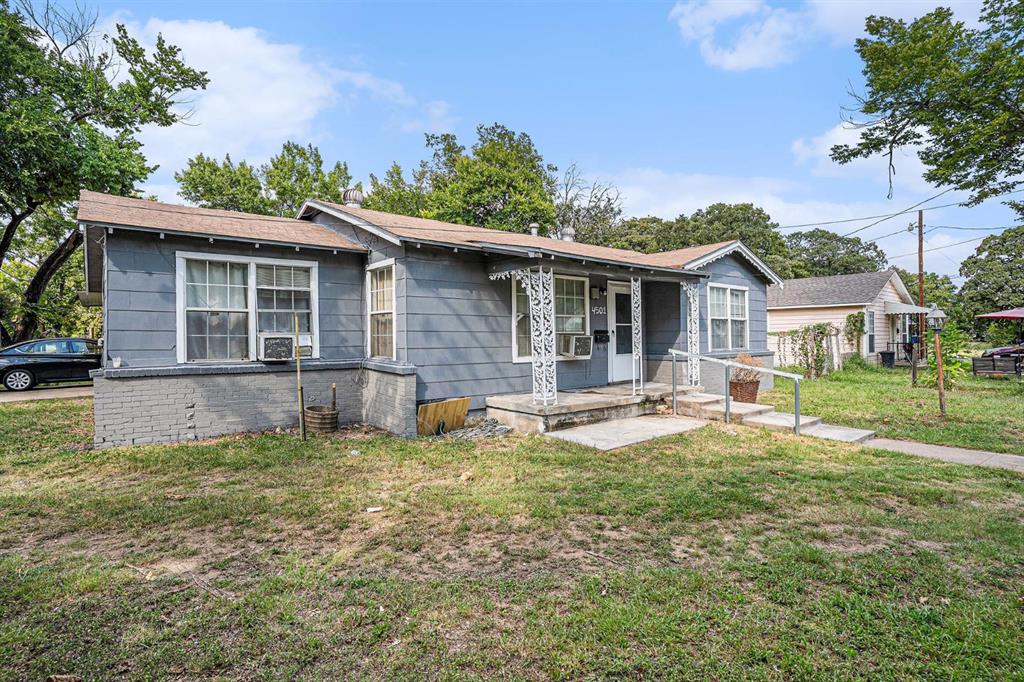 4501 Parrish Road Haltom City, TX 76117 - Photo 2 of 13 a view of a house with a yard and sitting area