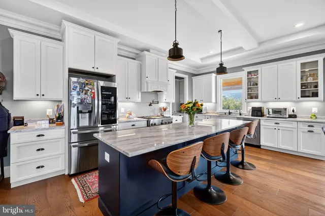 a bathroom with a sink toilet and mirror