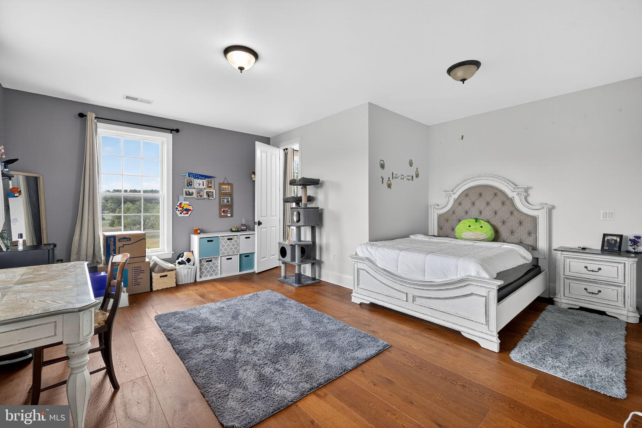 620 Tilthammer Mill Road Boyce, VA 22620 - Photo 27 of 57 a bedroom with a bed and wooden floor