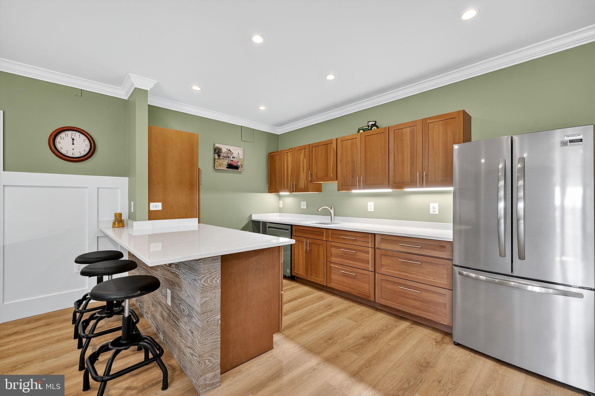 620 Tilthammer Mill Road Boyce, VA 22620 - Photo 38 of 57 a kitchen with stainless steel appliances granite countertop a refrigerator and a stove top oven