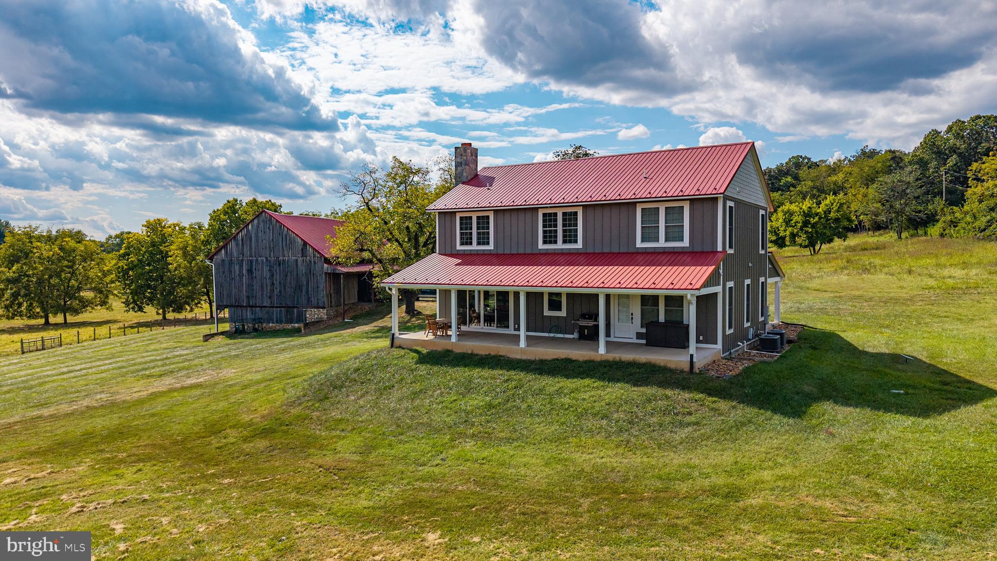 620 Tilthammer Mill Road Boyce, VA 22620 - Photo 6 of 57 a view of a house with garden and a yard