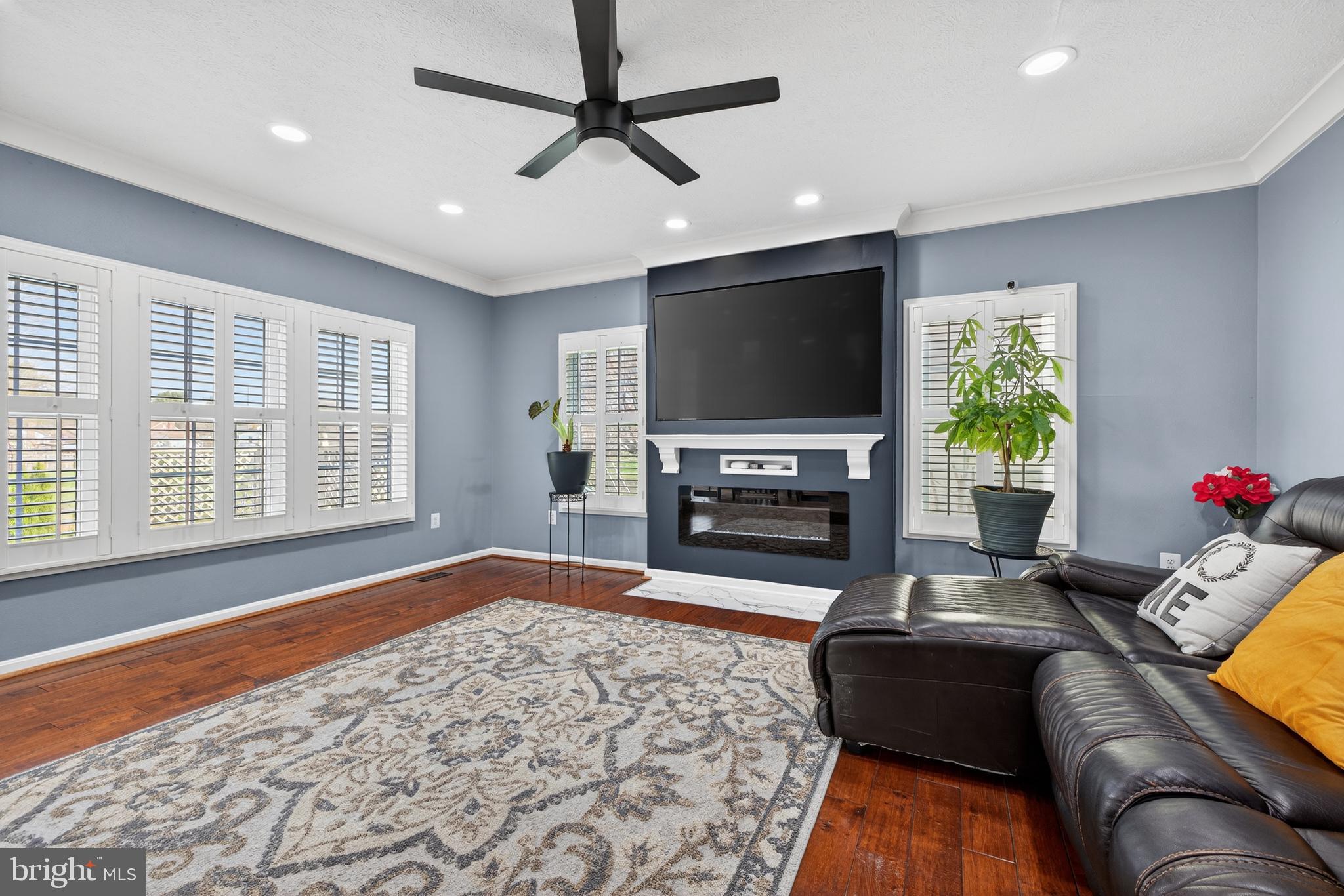 611 Hunting Ridge Drive Frederick, MD 21703 - Photo 21 of 50 a living room with furniture and a flat screen tv