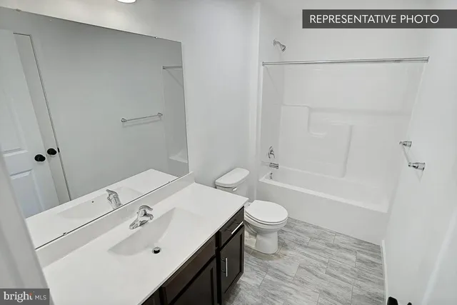 a bathroom with a shower and a bathtub