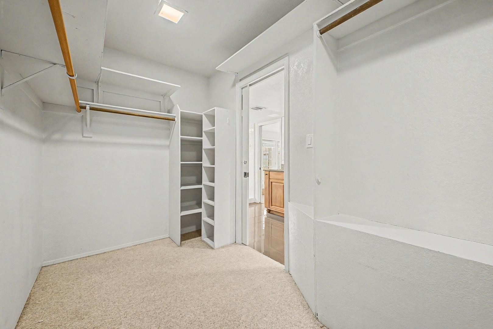 5736 North 25th Street Phoenix, AZ 85016 - Photo 18 of 59 a view of an empty walk in closet