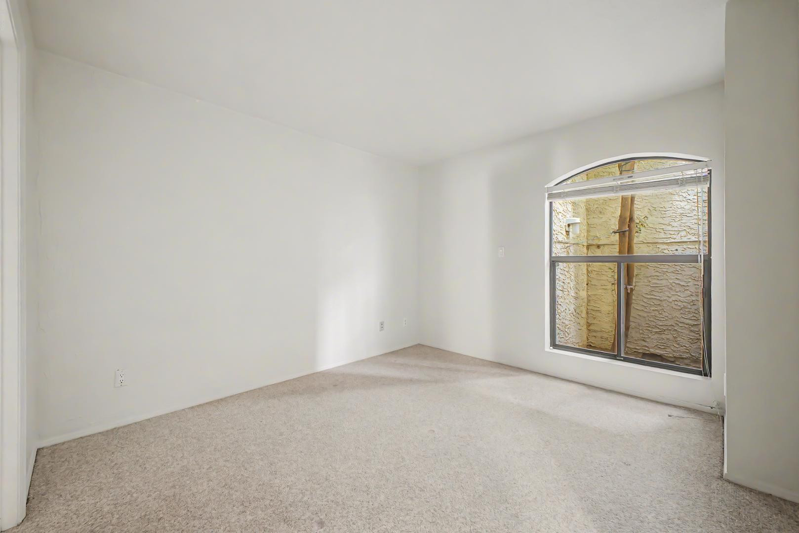5736 North 25th Street Phoenix, AZ 85016 - Photo 19 of 59 an empty room with a window