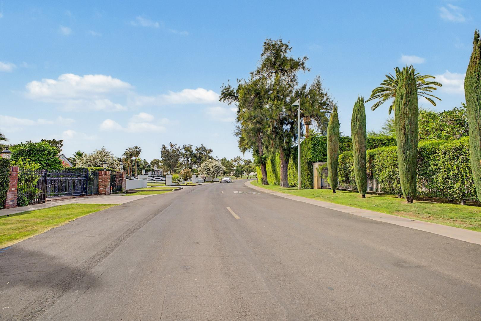5736 North 25th Street Phoenix, AZ 85016 - Photo 50 of 59 a view of a house with palm trees and a big yard