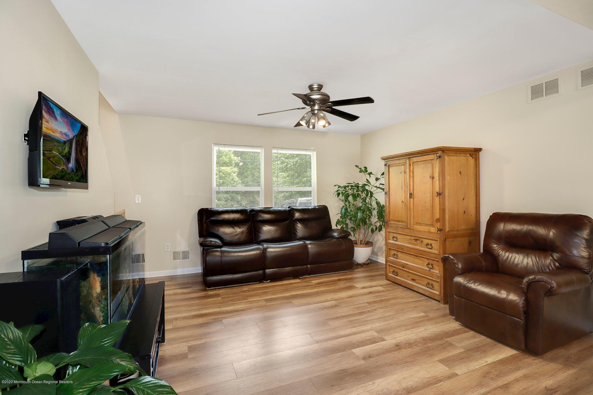 1403 Reed Road Cream Ridge, NJ 08514 - Photo 13 of 31 a living room with furniture and a window