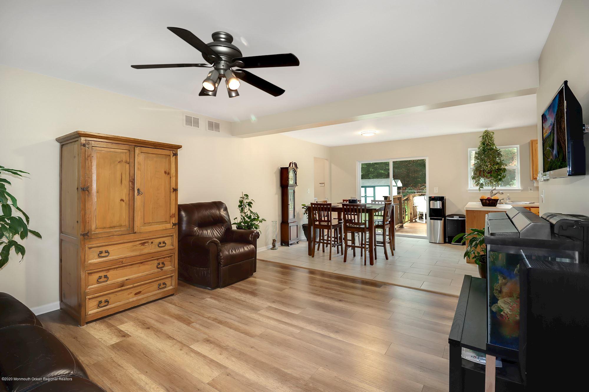 1403 Reed Road Cream Ridge, NJ 08514 - Photo 14 of 31 a living room with furniture and wooden floor