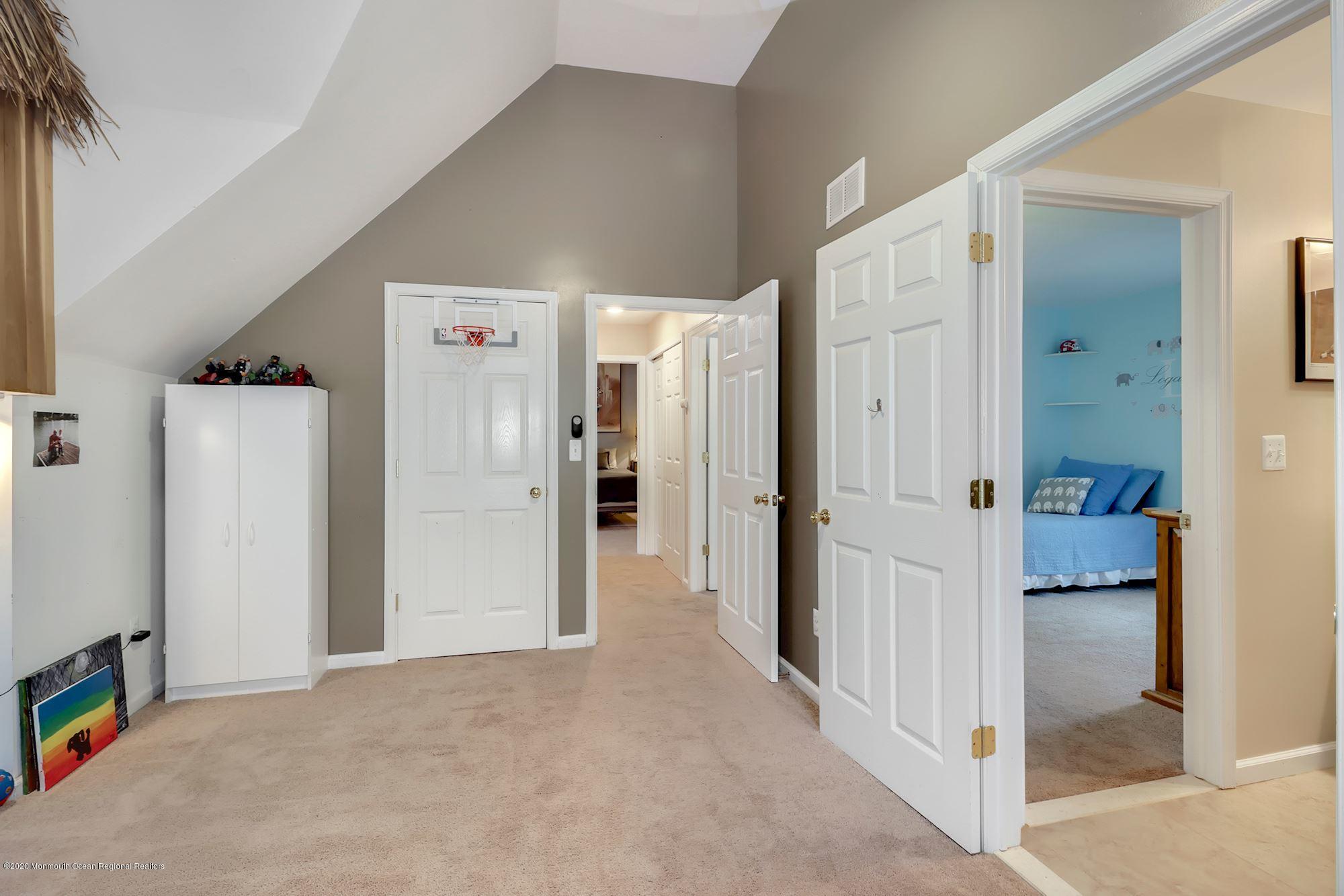 1403 Reed Road Cream Ridge, NJ 08514 - Photo 17 of 31 a view of a hallway with closet and livingroom view