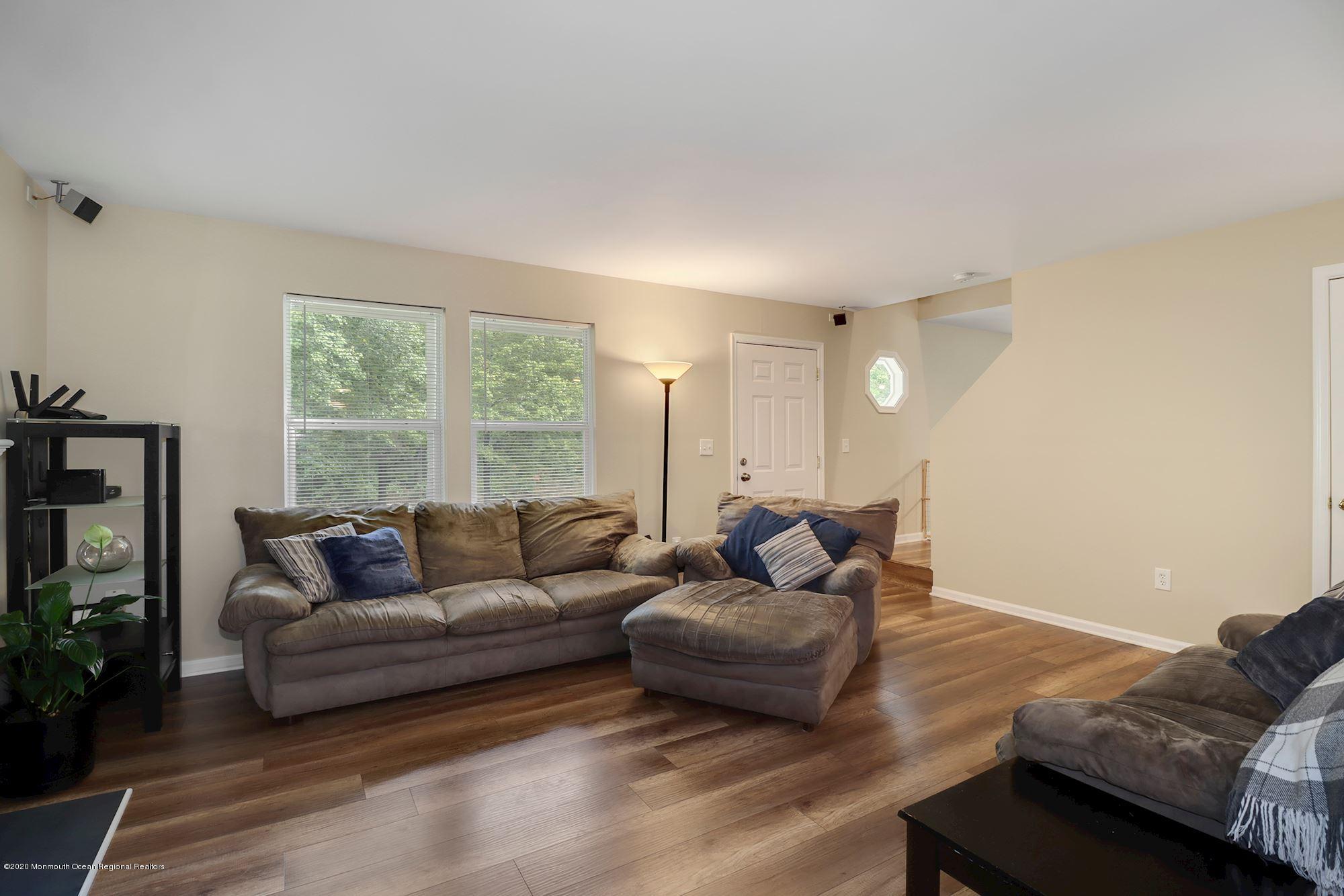 1403 Reed Road Cream Ridge, NJ 08514 - Photo 5 of 31 a living room with furniture and a window