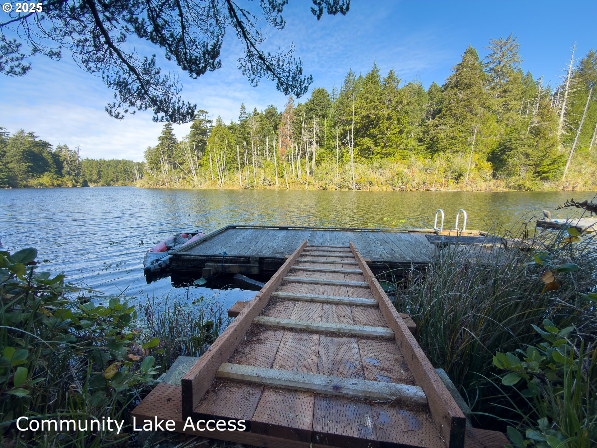 88629 Weiss Estate Road Bandon, OR 97411 - Photo 20 of 25 a view of a lake with a yard