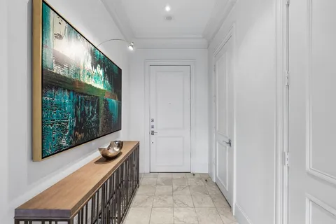 a view of hallway with windows