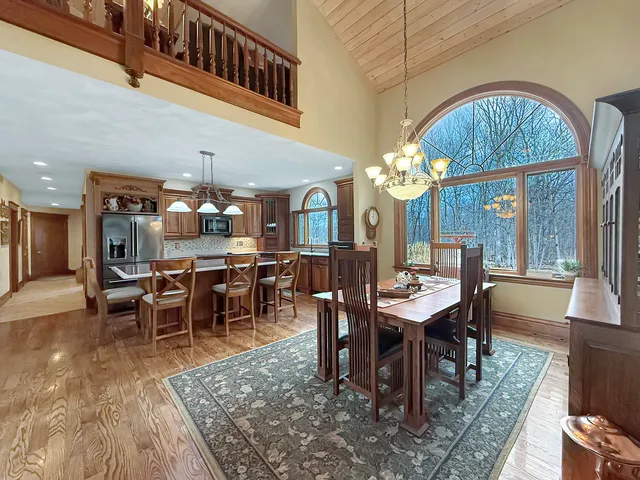 a bedroom with a bed and a dresser in it