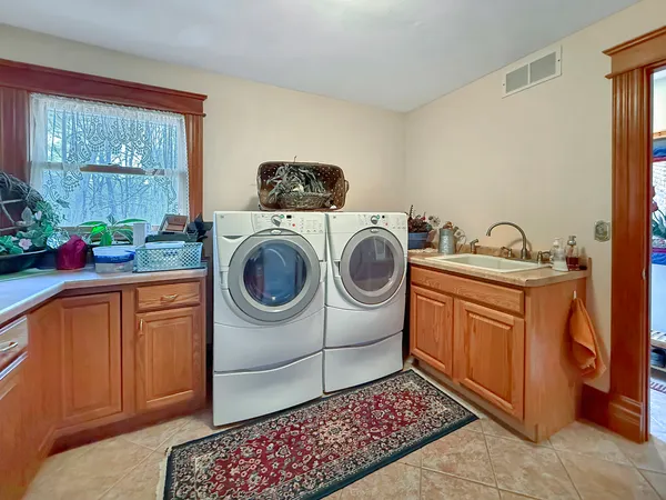 a very nice looking room with furniture and a large window