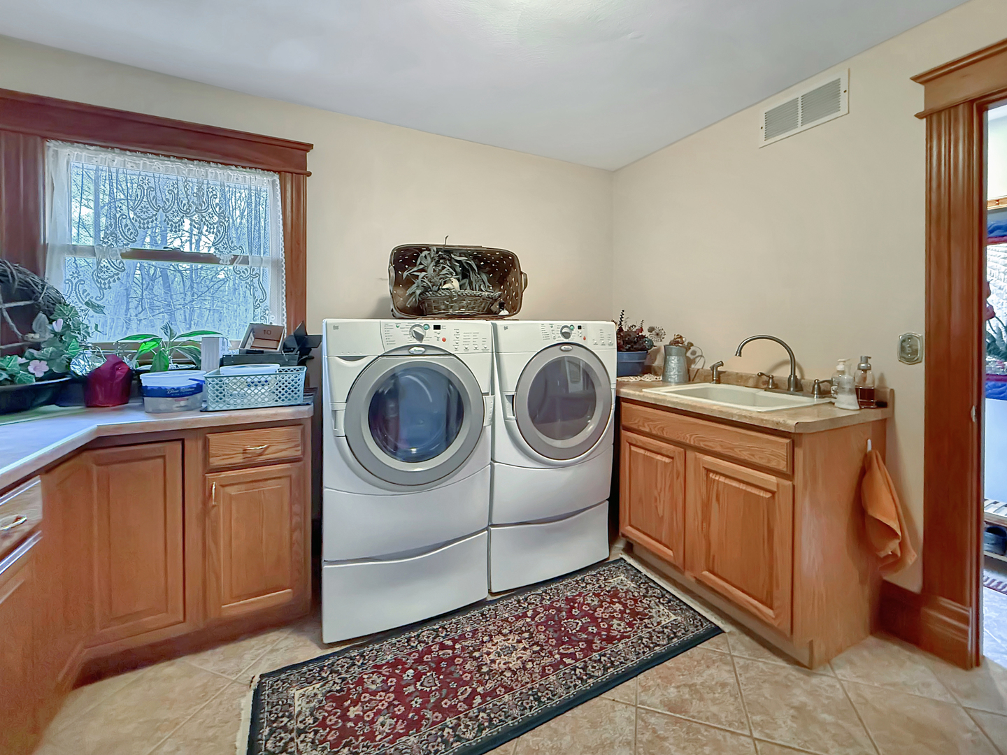 11307 Timber Lane Lena, IL 61048 - Photo 28 of 85 a utility room with sink dryer and washer