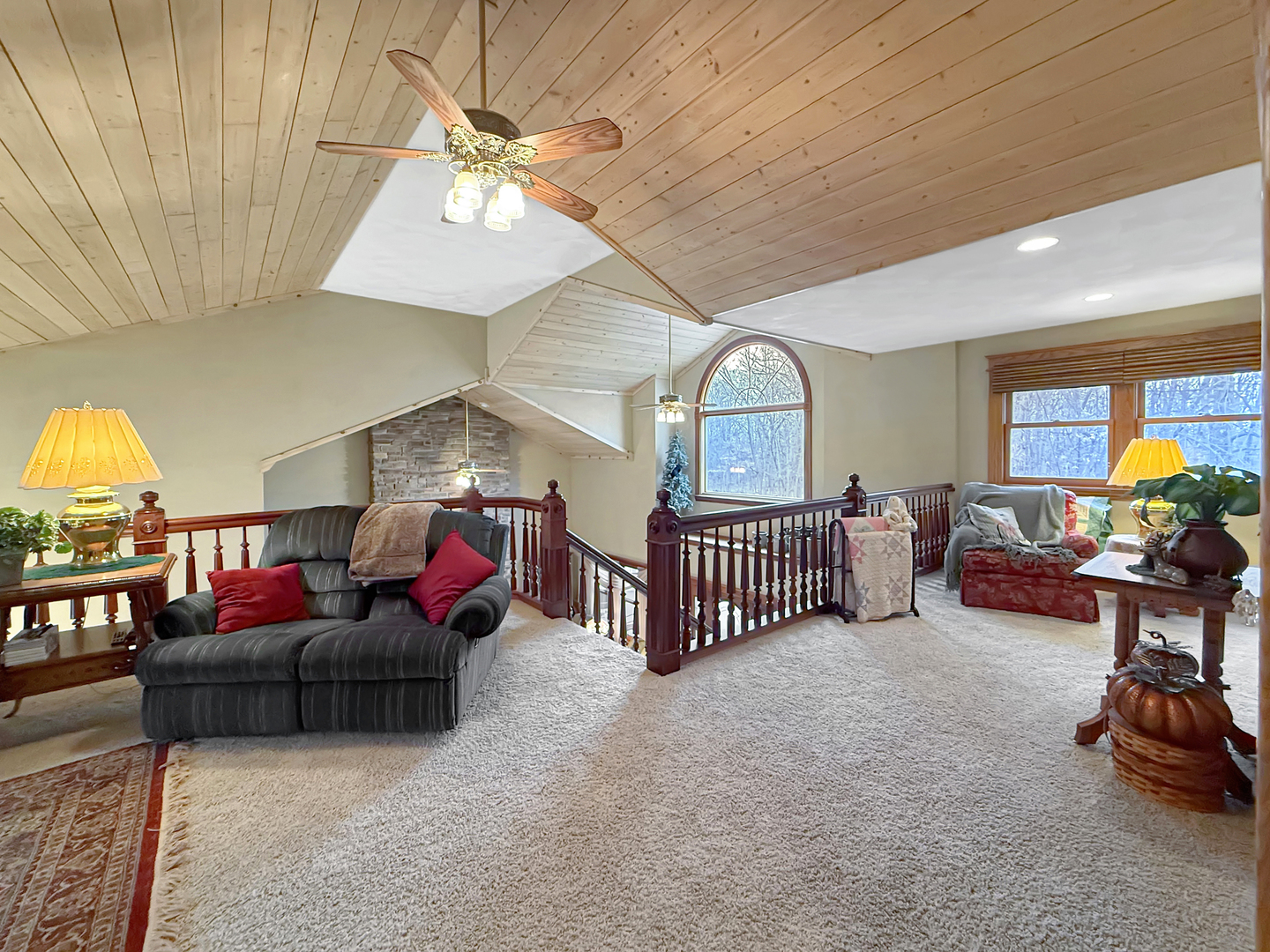 11307 Timber Lane Lena, IL 61048 - Photo 61 of 85 a living room with furniture gym equipment and a large window