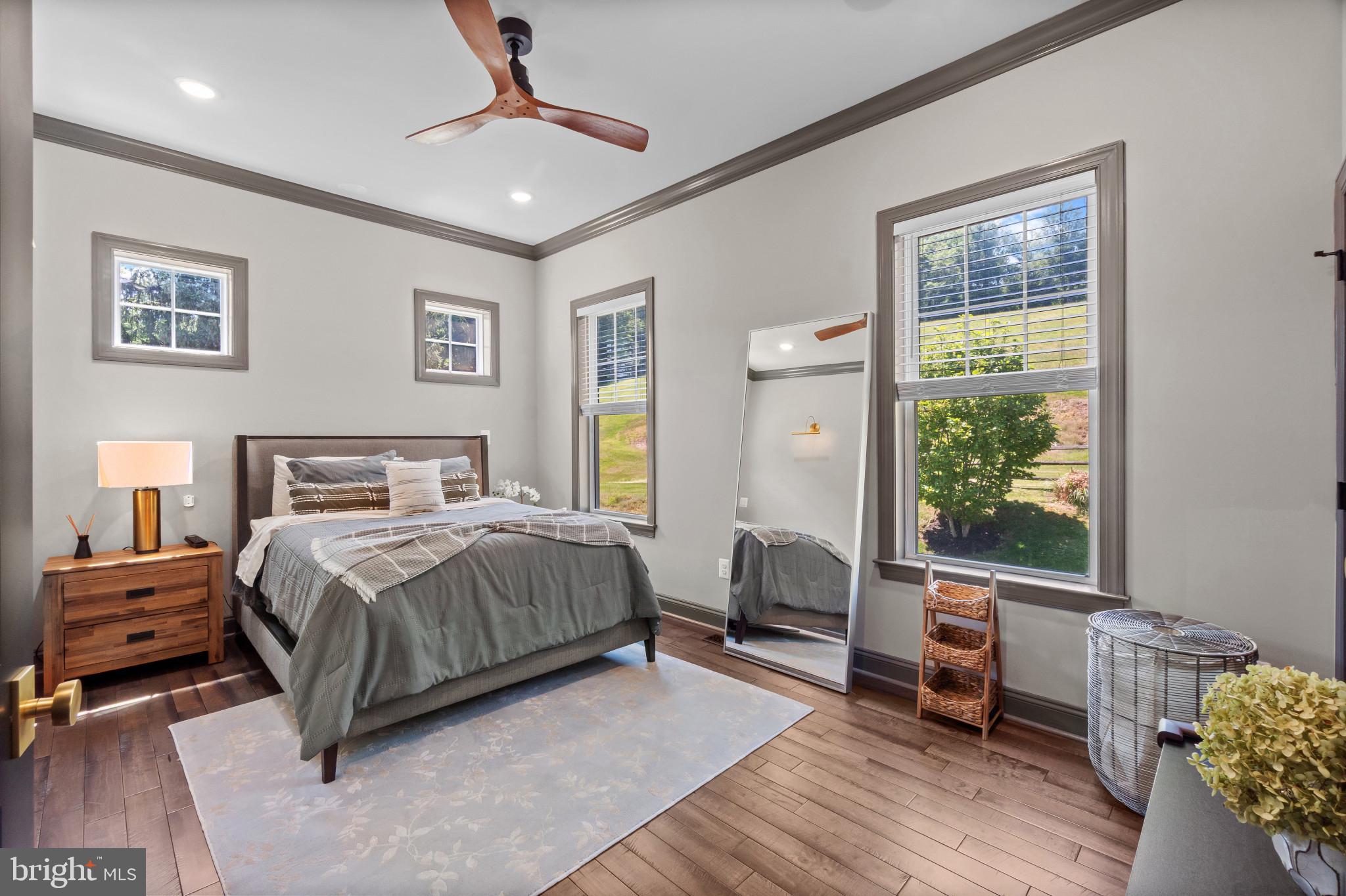 10907 Hollow Road Cockeysville, MD 21030 - Photo 21 of 57 a bedroom with a bed and a window