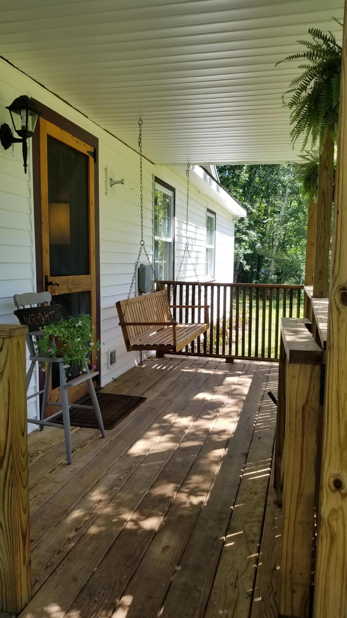 336 Point Road Ellsworth, ME 04605 - Photo 3 of 32 Covered Front Porch w/Swing