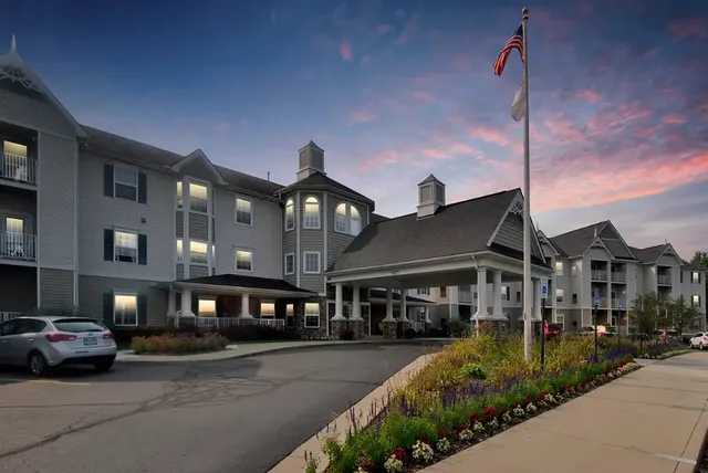 a front view of a building with garden