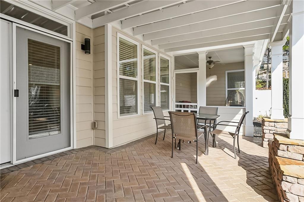 356 Shoal Creek Way Dallas, GA 30132 - Photo 20 of 32 a dining room with a table and chairs