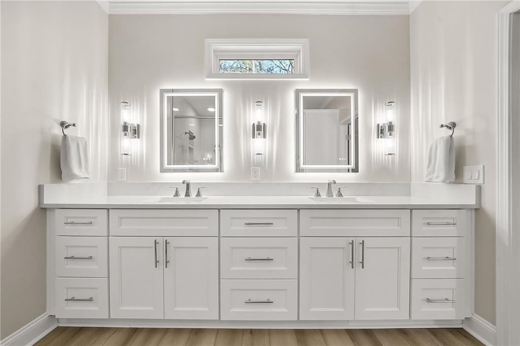356 Shoal Creek Way Dallas, GA 30132 - Photo 9 of 32 a view of granite countertop white cabinets with a large window