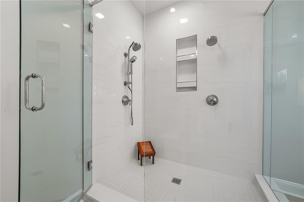 356 Shoal Creek Way Dallas, GA 30132 - Photo 10 of 32 a bathroom with a shower