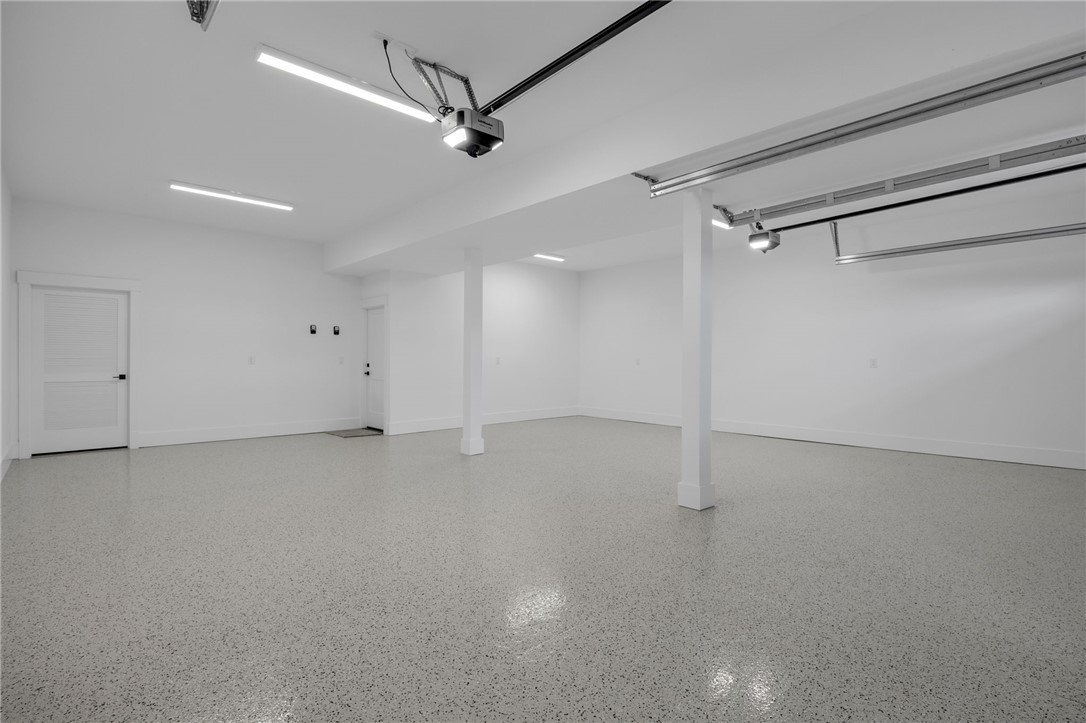 1230 Melton Road, Unit 216 West Union, SC 29696 - Photo 36 of 49 A spacious, newly finished garage with a pristine, speckled epoxy floor.