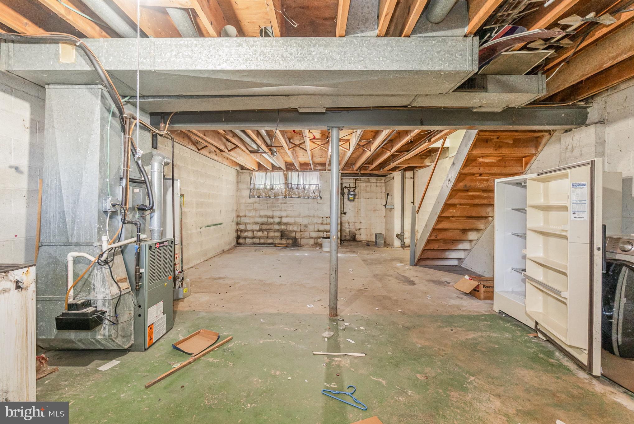 2137 Cockspur Road Baltimore, MD 21220 - Photo 20 of 25 a view of a room with wooden floor and windows