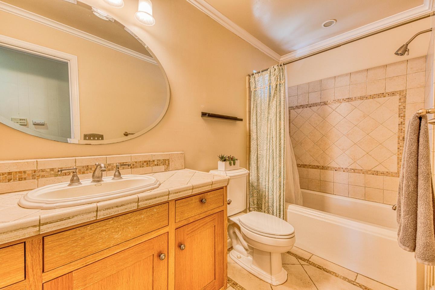 394 Mesa Road Salinas, CA 93908 - Photo 32 of 53 a bathroom with a sink a toilet and shower