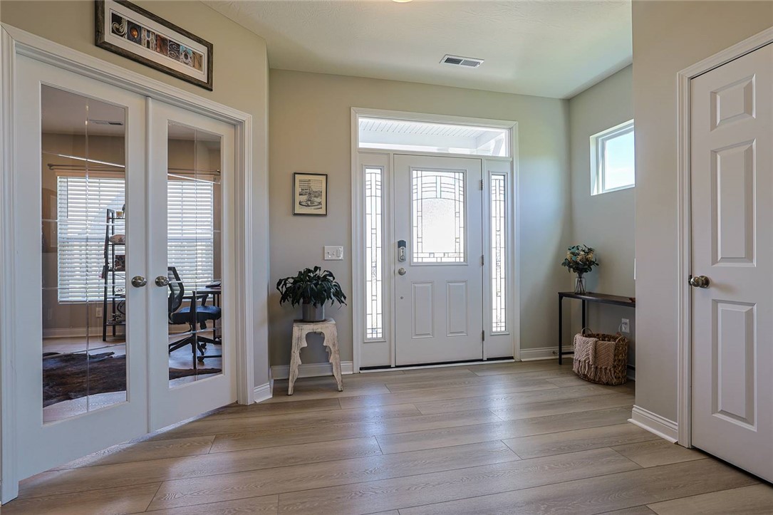 5013 Arena Court Hamilton, OH 45011 - Photo 3 of 41 Enter into a welcoming foyer with elegant flooring and ample natural light.