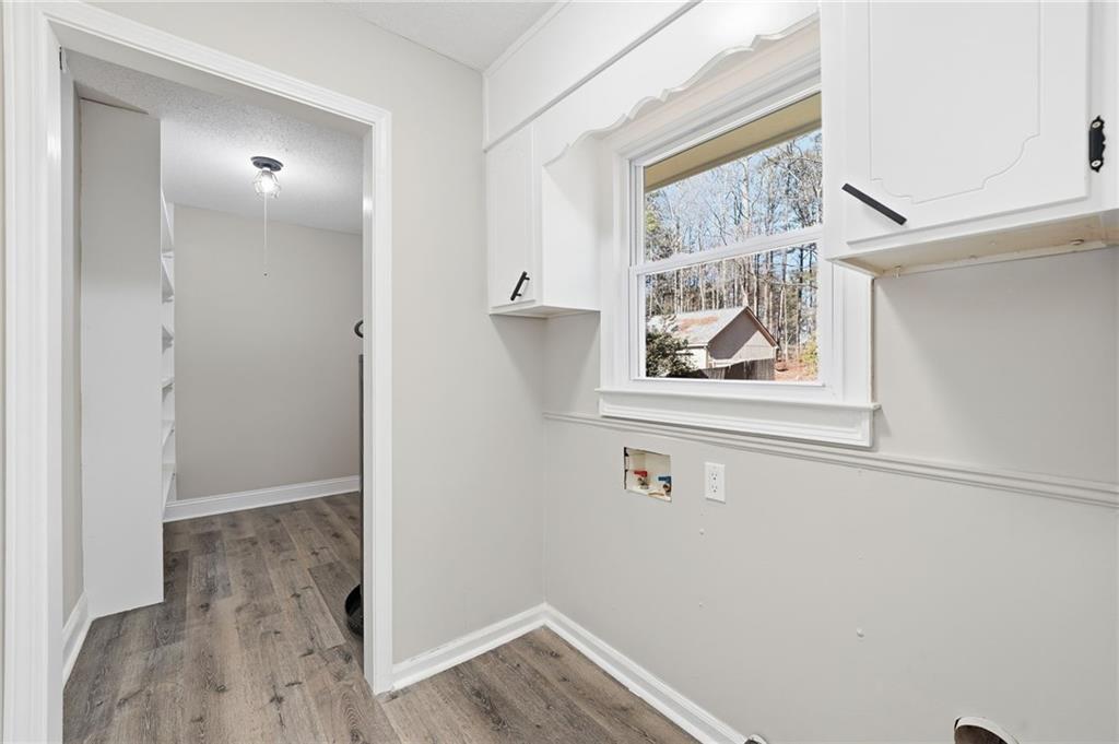 2702 Beecher Drive Austell, GA 30106 - Photo 19 of 27 a view of front door with wooden floor